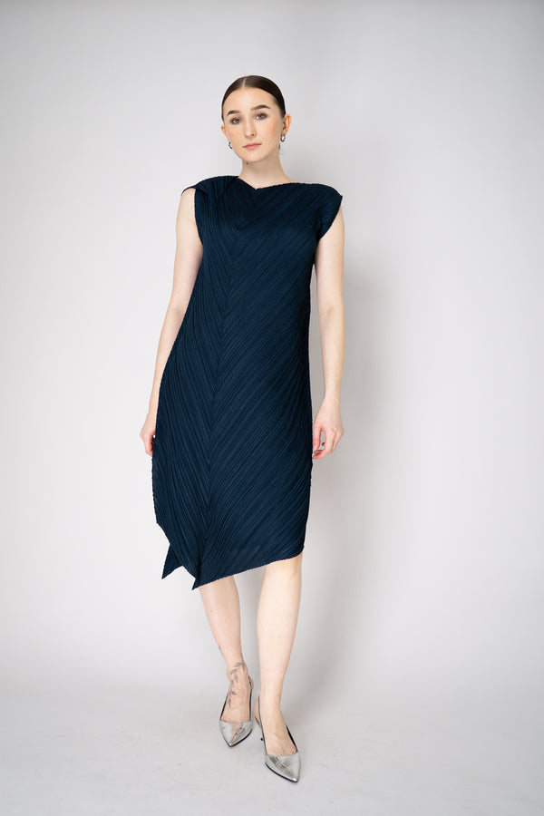 Pleats Please Issey Miyake Flare Sleeveless Dress in Navy Vancouver. Shop Online or in Store.