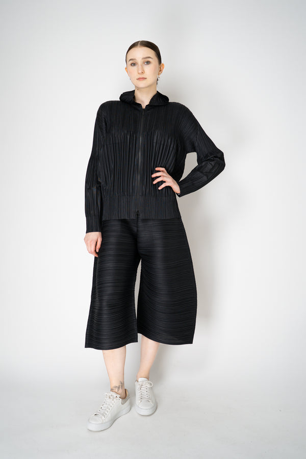 Pleats Please Issey Miyake Fluffy Basics Hooded Zip-Up Jacket in Black Vancouver. Shop Online or in Store