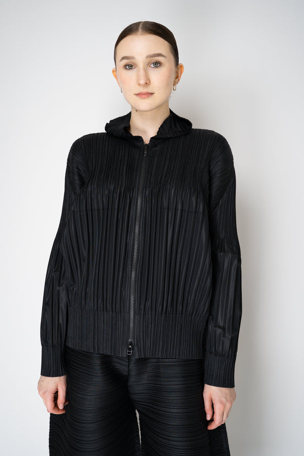 Pleats Please Issey Miyake Fluffy Basics Hooded Zip-Up Jacket in Black Vancouver. Shop Online or in Store
