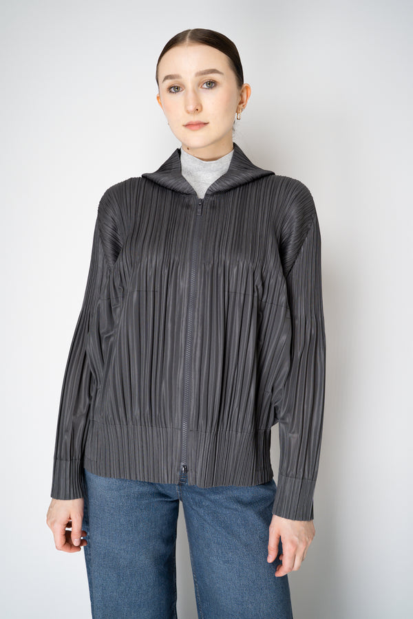Pleats Please Issey Miyake Fluffy Basics Hooded Zip-Up Jacket in Dark Grey Vancouver. Shop Online or in Store