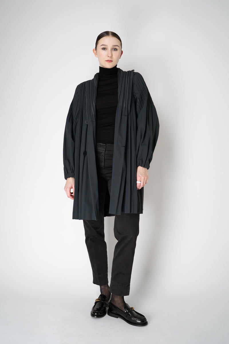 Pleats Please Issey Miyake Knee Length Smooth Coat in Charcoal Vancouver. Shop Online or in Store.