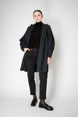 Pleats Please Issey Miyake Knee Length Smooth Coat in Charcoal Vancouver. Shop Online or in Store.