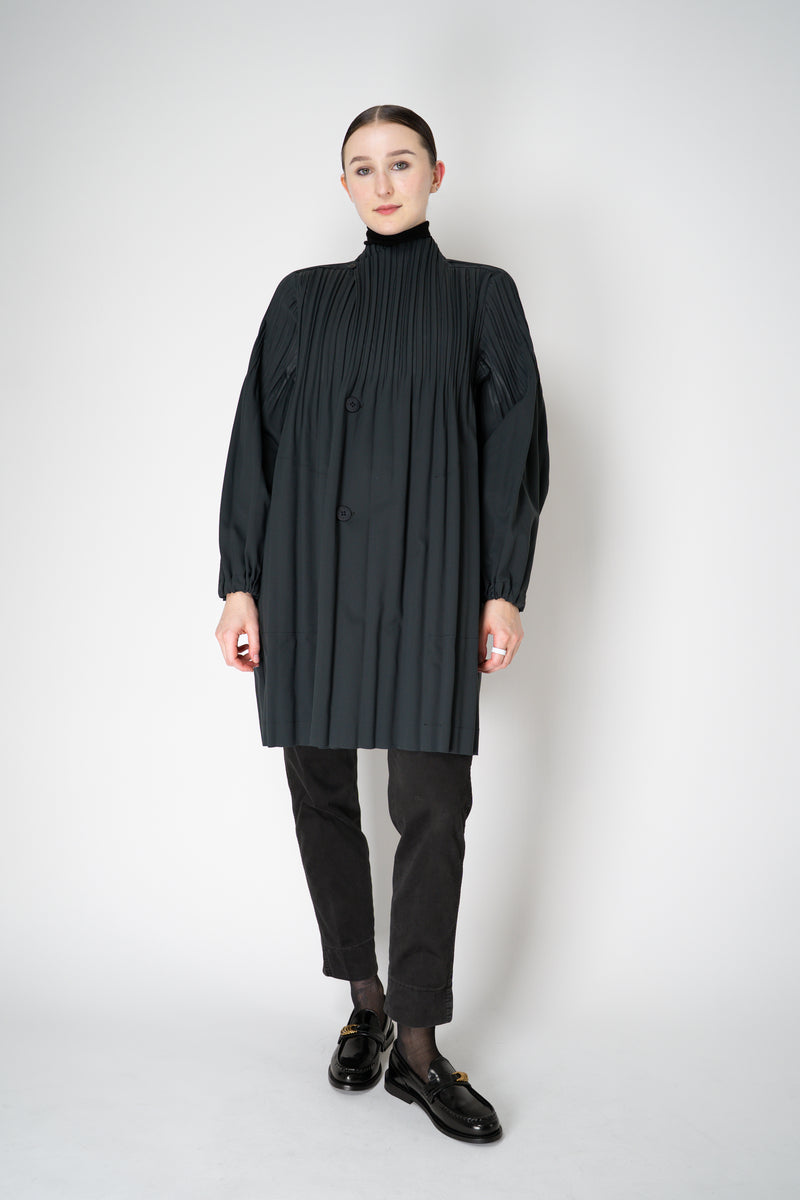 Pleats Please Issey Miyake Knee Length Smooth Coat in Charcoal Vancouver. Shop Online or in Store.