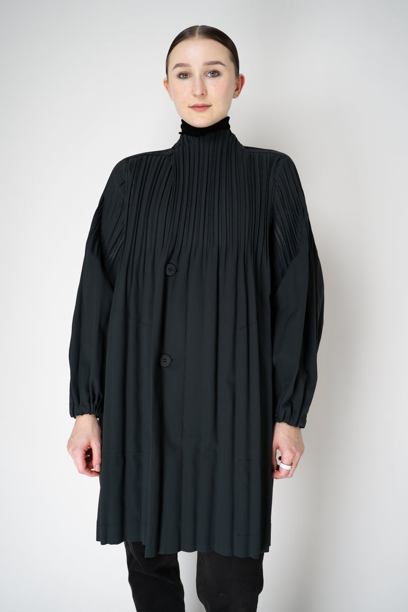 Pleats Please Issey Miyake Knee Length Smooth Coat in Charcoal Vancouver. Shop Online or in Store.