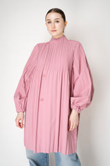 Pleats Please Issey Miyake Knee Length Smooth Coat in Pink Vancouver. Shop Online or in Store.