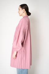 Pleats Please Issey Miyake Knee Length Smooth Coat in Pink Vancouver. Shop Online or in Store.