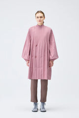 Pleats Please Issey Miyake Knee Length Smooth Coat in Pink Vancouver. Shop Online or in Store.