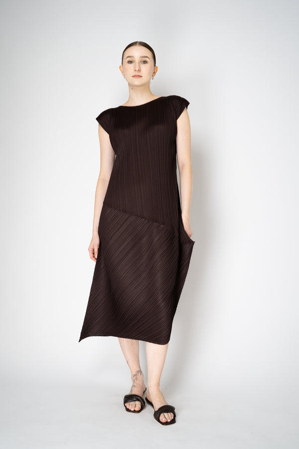 Pleats Please Issey Miyake Leap Asymmetric Hem Dress in Chocolate Brown Vancouver. Shop Online or in Store