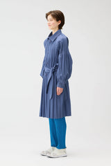Pleats Please Issey Miyake Long Smooth Coat in Blue Grey Vancouver. Shop Online or in Store.