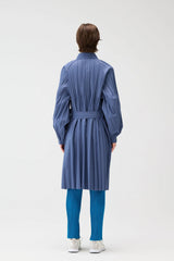 Pleats Please Issey Miyake Long Smooth Coat in Blue Grey Vancouver. Shop Online or in Store.
