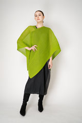 Pleats Please Issey Miyake Madame-T August in Neon Green Vancouver. Shop Online or in Store.