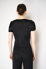 Pleats Please Issey Miyake Monthly Colors: April Pleated T-Shirt in Black Vancouver. Shop Online or in Store.