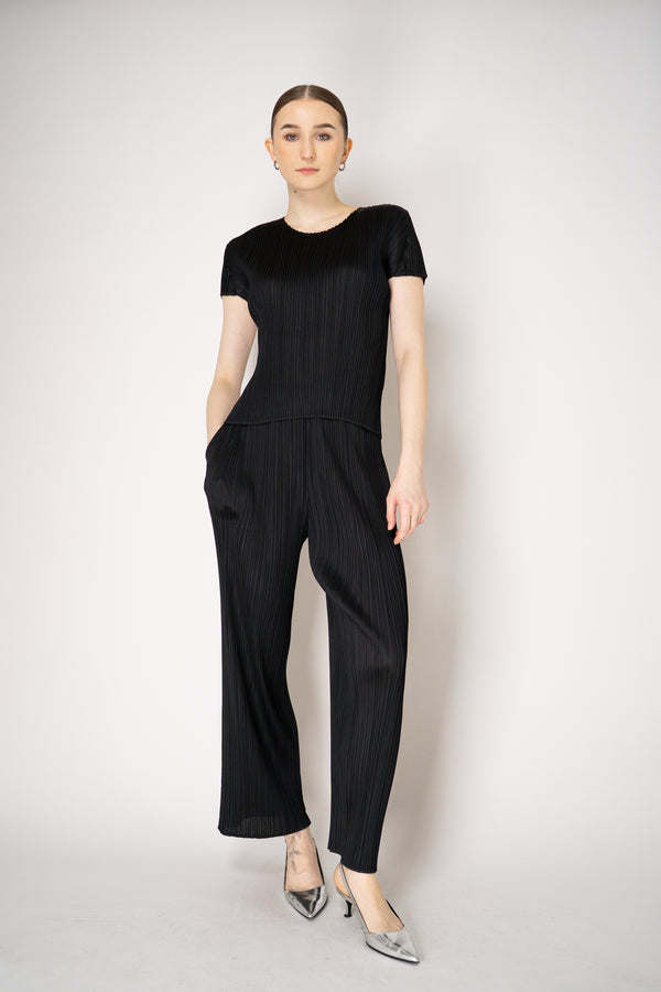 Pleats Please Issey Miyake Monthly Colors: April Straight Leg Pants in Black Vancouver. Shop Online or in Store.