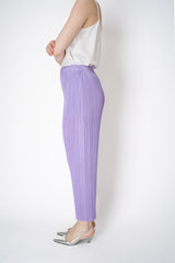 Pleats Please Issey Miyake Monthly Colors: April Straight Leg Pants in Lilac Vancouver. Shop Online or in Store.