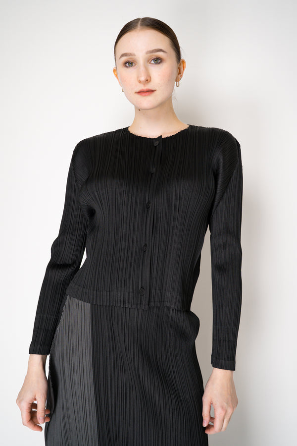 Pleats Please Issey Miyake Monthly Colors: August Cardigan in Black Vancouver. Shop Online or in Store.