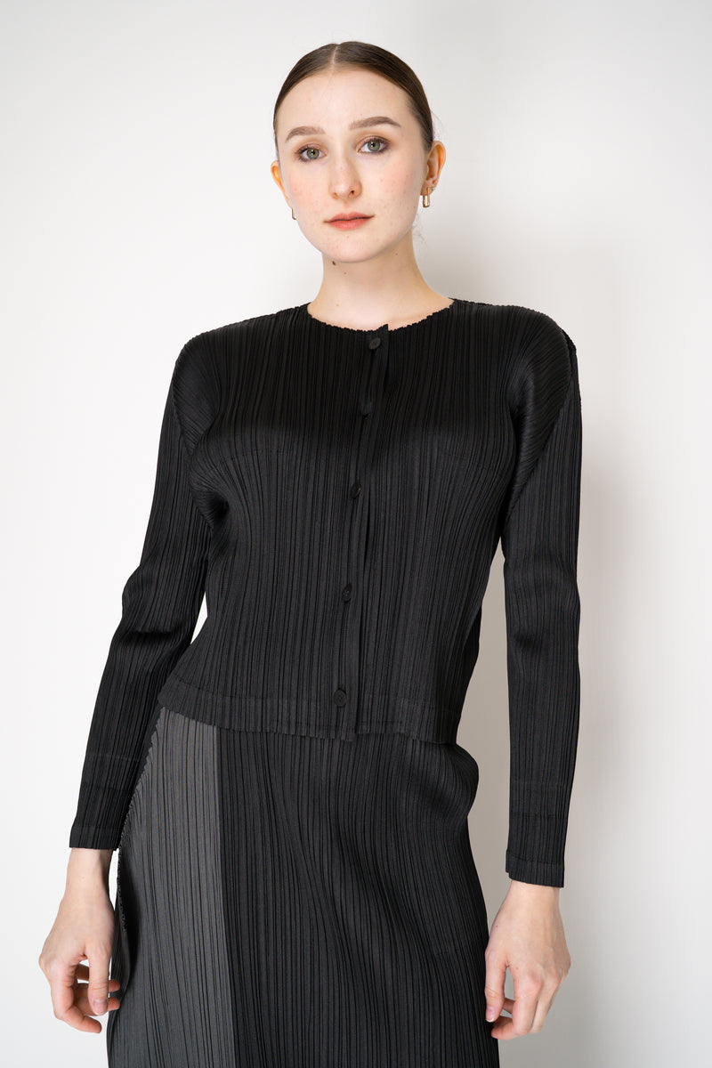 Pleats Please Issey Miyake Monthly Colors: August Cardigan in Black Vancouver. Shop Online or in Store.