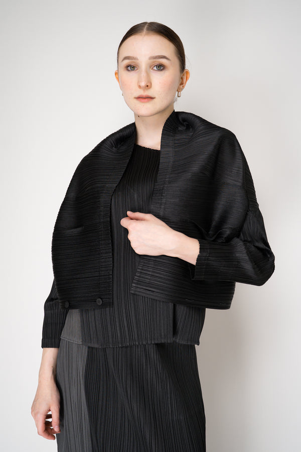 Pleats Please Issey Miyake Monthly Colors: August Cardigan in Black Vancouver. Shop Online or in Store.