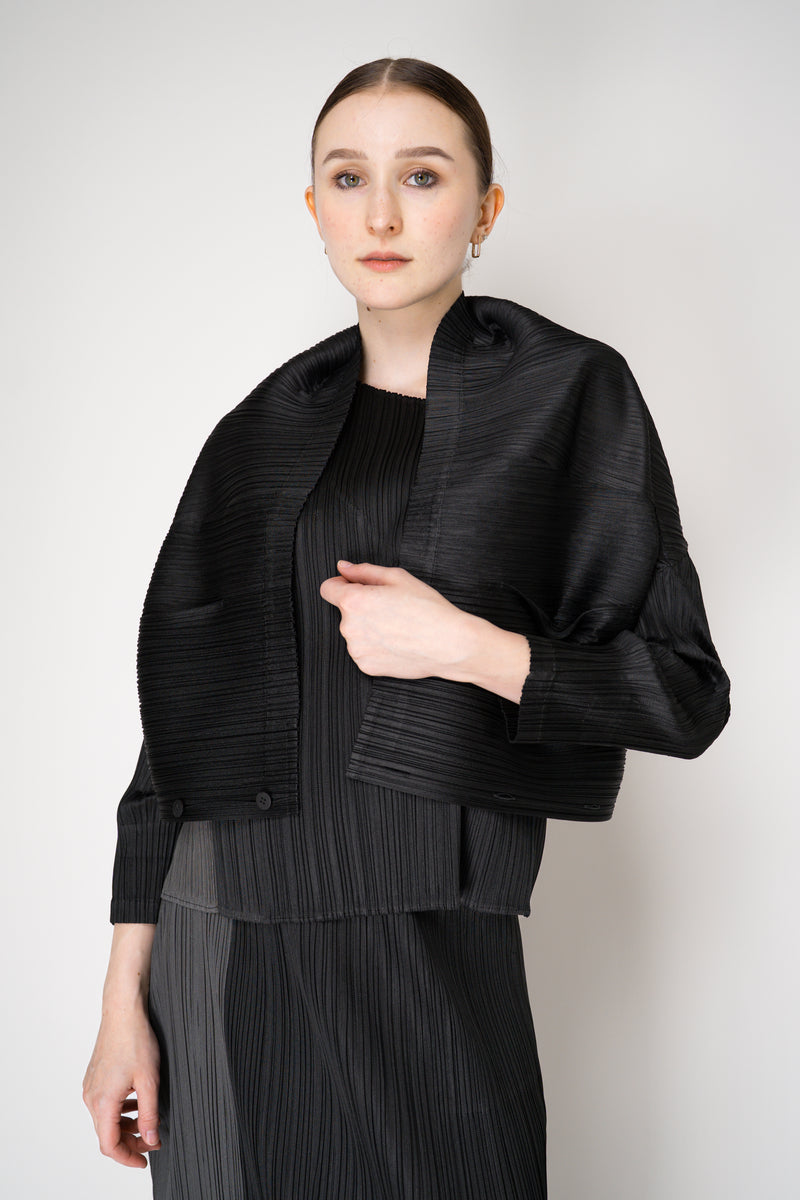 Pleats Please Issey Miyake Monthly Colors: August Cardigan in Black Vancouver. Shop Online or in Store.