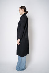 Pleats Please Issey Miyake Monthly Colors: February Collared Coat in Black Vancouver. Shop Online or in Store.