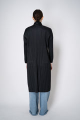 Pleats Please Issey Miyake Monthly Colors: February Collared Coat in Black Vancouver. Shop Online or in Store.