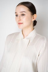 Pleats Please Issey Miyake Monthly Colors: February Collared Coat in Off-White Vancouver. Shop Online or in Store.