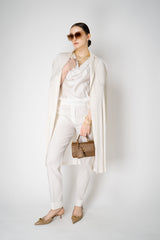 Pleats Please Issey Miyake Monthly Colors: February Collared Coat in Off-White Vancouver. Shop Online or in Store.