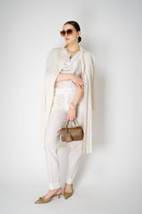 Pleats Please Issey Miyake Monthly Colors: February Collared Coat in Off-White Vancouver. Shop Online or in Store.