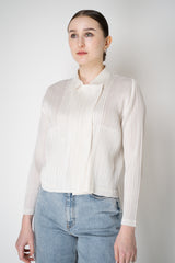 Pleats Please Issey Miyake Monthly Colors: February Short Jacket in Off-White Vancouver. Shop Online or in Store.