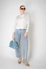 Pleats Please Issey Miyake Monthly Colors: February Short Jacket in Off-White Vancouver. Shop Online or in Store.