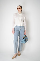 Pleats Please Issey Miyake Monthly Colors: February Short Jacket in Off-White Vancouver. Shop Online or in Store.