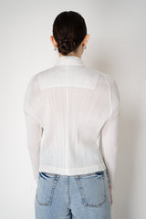Pleats Please Issey Miyake Monthly Colors: February Short Jacket in Off-White Vancouver. Shop Online or in Store.