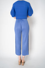 Pleats Please Issey Miyake Monthly Colors: February Wide Leg Pants in Periwinkle Vancouver. Shop Online or in Store.