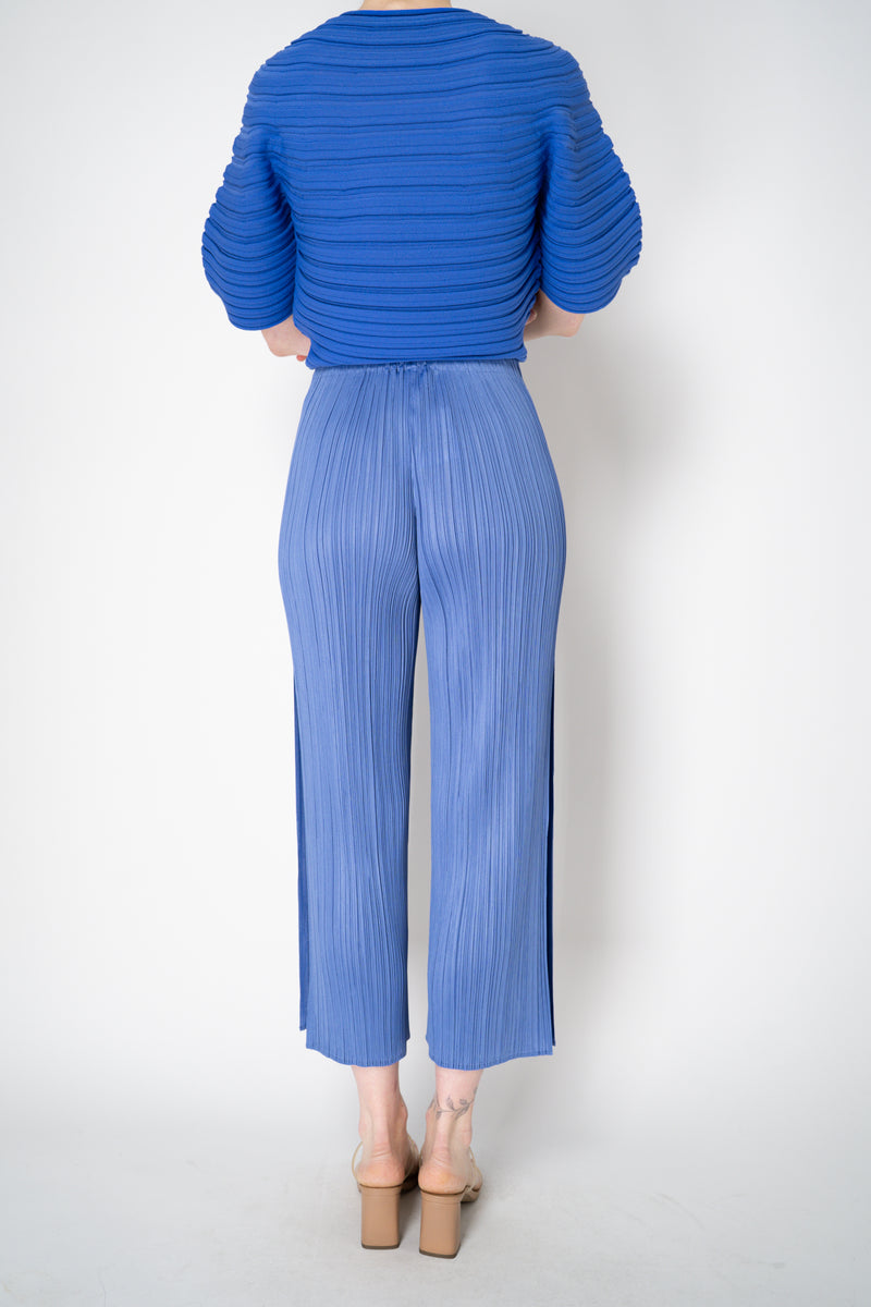 Pleats Please Issey Miyake Monthly Colors: February Wide Leg Pants in Periwinkle Vancouver. Shop Online or in Store.