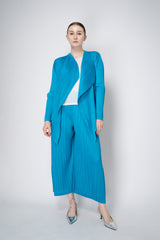 Pleats Please Issey Miyake Monthly Colors: January Drapey Lapel Cardigan in Aqua Blue Vancouver. Shop Online or in Store.