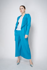 Pleats Please Issey Miyake Monthly Colors: January Drapey Lapel Cardigan in Aqua Blue Vancouver. Shop Online or in Store.