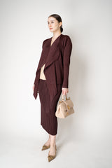 Pleats Please Issey Miyake Monthly Colors: January Drapey Lapel Cardigan in Cacao Brown Vancouver. Shop Online or in Store.