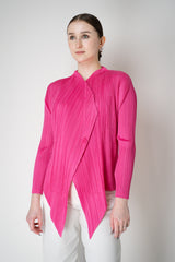 Pleats Please Issey Miyake Monthly Colors: January Drapey Lapel Cardigan in Fuchsia Vancouver. Shop Online or in Store.