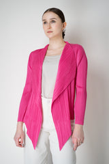 Pleats Please Issey Miyake Monthly Colors: January Drapey Lapel Cardigan in Fuchsia Vancouver. Shop Online or in Store.