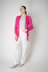 Pleats Please Issey Miyake Monthly Colors: January Drapey Lapel Cardigan in Fuchsia Vancouver. Shop Online or in Store.