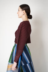 Pleats Please Issey Miyake Monthly Colors: January Rib Pleats January Cropped Bat Sleeves Cardigan in Cacao Brown Vancouver. Shop Online or in Store.