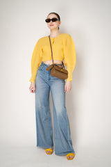 Pleats Please Issey Miyake Monthly Colors: January Rib Pleats January Cropped Bat Sleeves Cardigan in Yellow Vancouver. Shop Online or in Store.