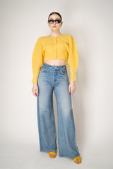 Pleats Please Issey Miyake Monthly Colors: January Rib Pleats January Cropped Bat Sleeves Cardigan in Yellow Vancouver. Shop Online or in Store.