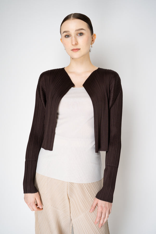 Pleats Please Issey Miyake Monthly Colors: July Cropped Open Front Cardigan in Chocolate Brown Vancouver. Shop Online or in Store
