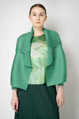 Pleats Please Issey Miyake Monthly Colors: March Cardigan in Grass Green Vancouver. Shop Online or in Store.