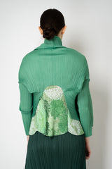 Pleats Please Issey Miyake Monthly Colors: March Cardigan in Grass Green Vancouver. Shop Online or in Store.