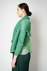 Pleats Please Issey Miyake Monthly Colors: March Cardigan in Grass Green Vancouver. Shop Online or in Store.