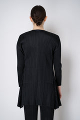 Pleats Please Issey Miyake "Olé!" Open Front Cardigan in Black Vancouver. Shop Online or in Store.
