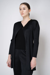 Pleats Please Issey Miyake "Olé!" Open Front Cardigan in Black Vancouver. Shop Online or in Store.