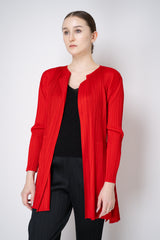 Pleats Please Issey Miyake "Olé!" Open Front Cardigan in Electric Red Vancouver. Shop Online or in Store.

