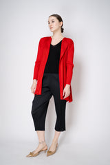 Pleats Please Issey Miyake "Olé!" Open Front Cardigan in Electric Red Vancouver. Shop Online or in Store.
